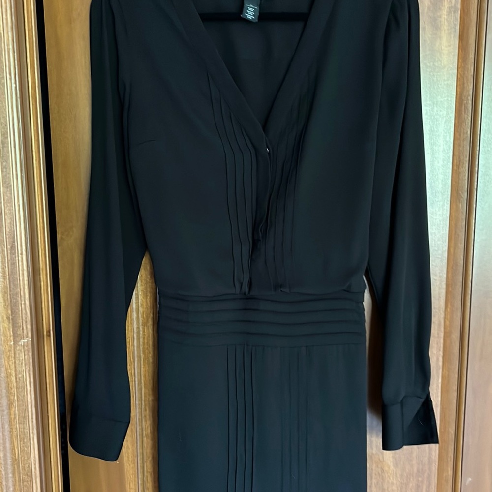 WHBM black dress.Pleated back is very stylish.Side zipper gives waist definition
